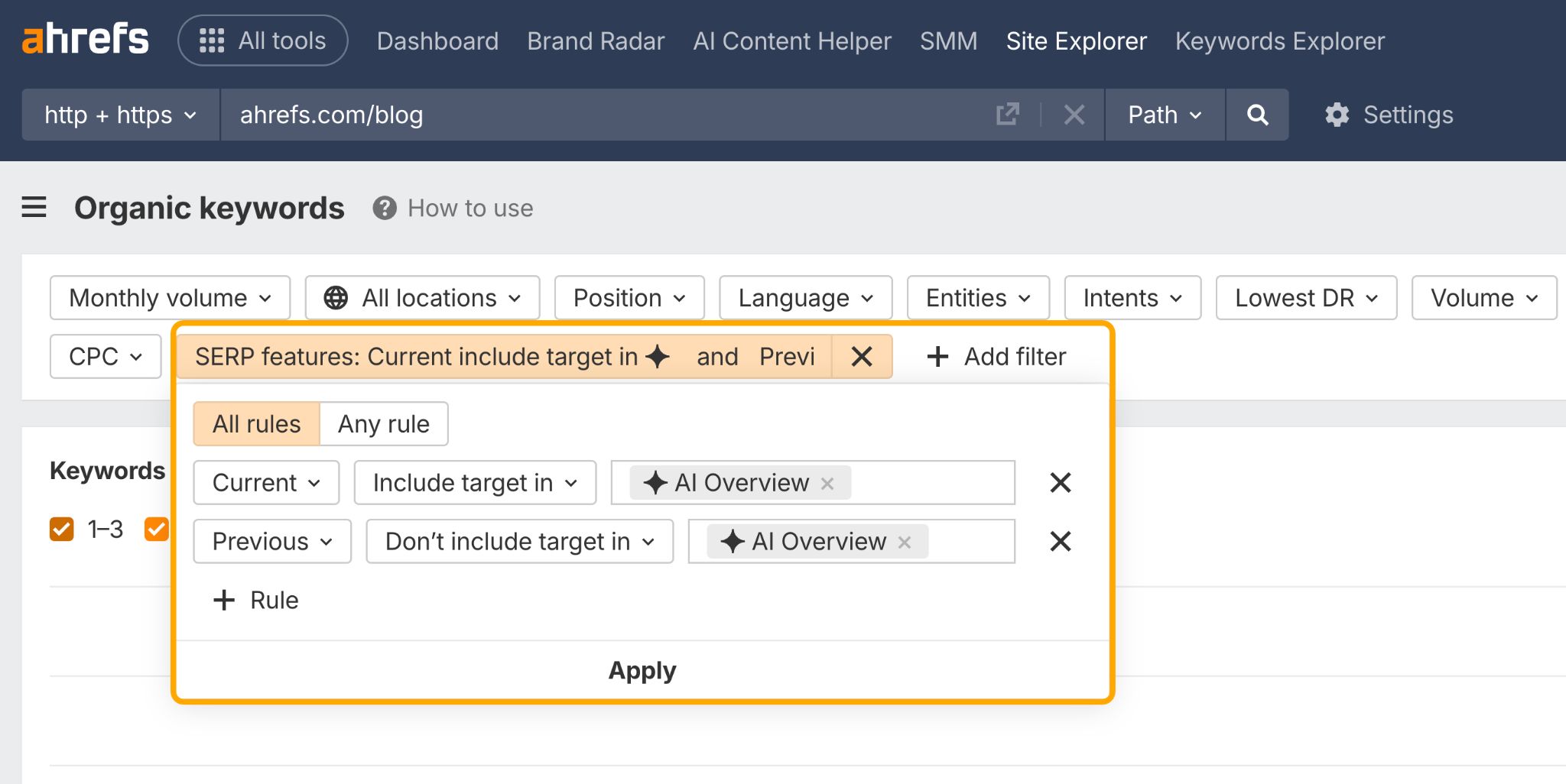 Ahrefs Site Explorer showing SERP features filter modal with rules for "Current include target in AI Overview" and "Previous Don't include target in AI Overview"